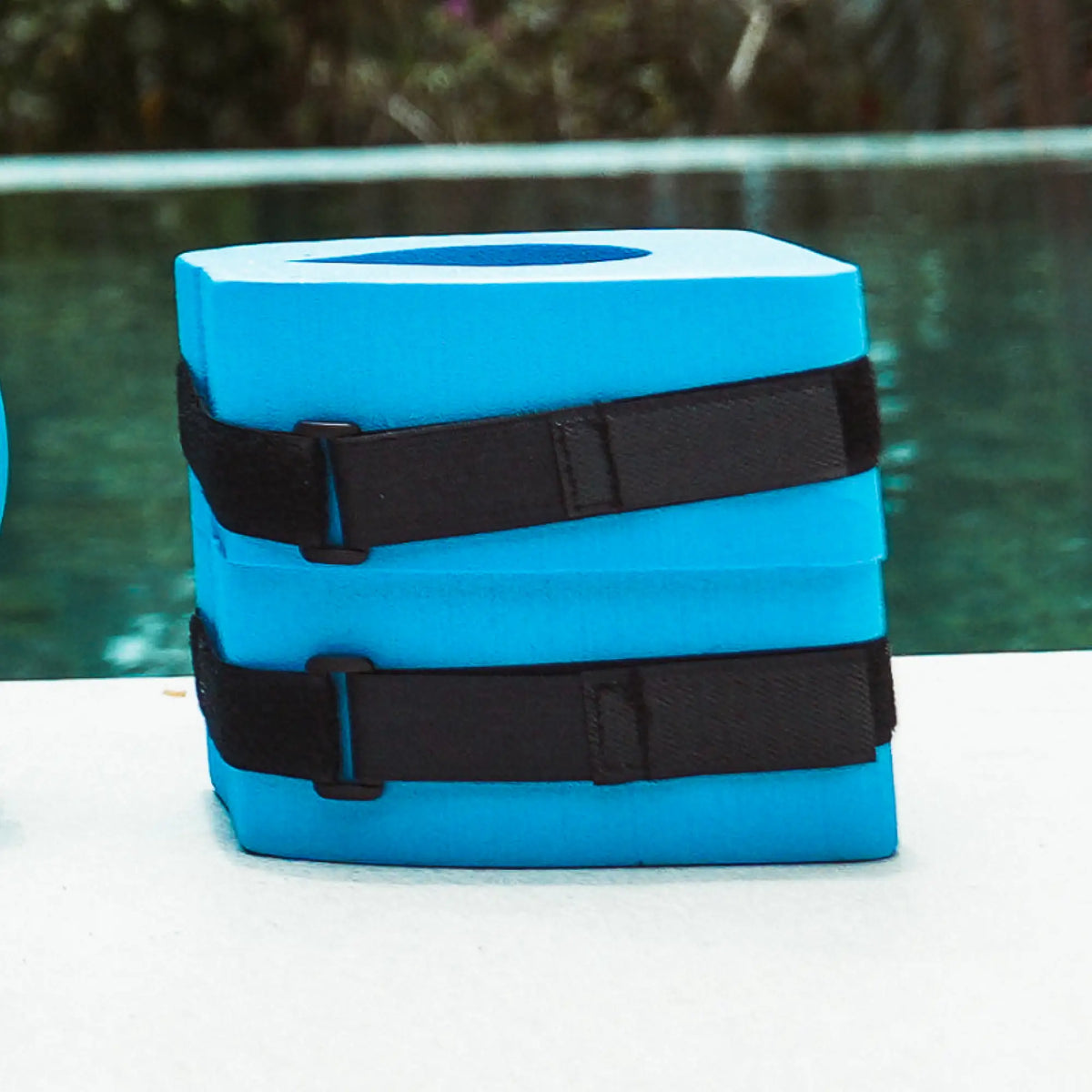 Pair of aquafitness ankle dumbbells with support straps.